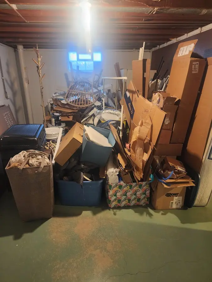 Roll-off dumpster container at job site for 6 Yard Dumpster Rental in Bella Vista